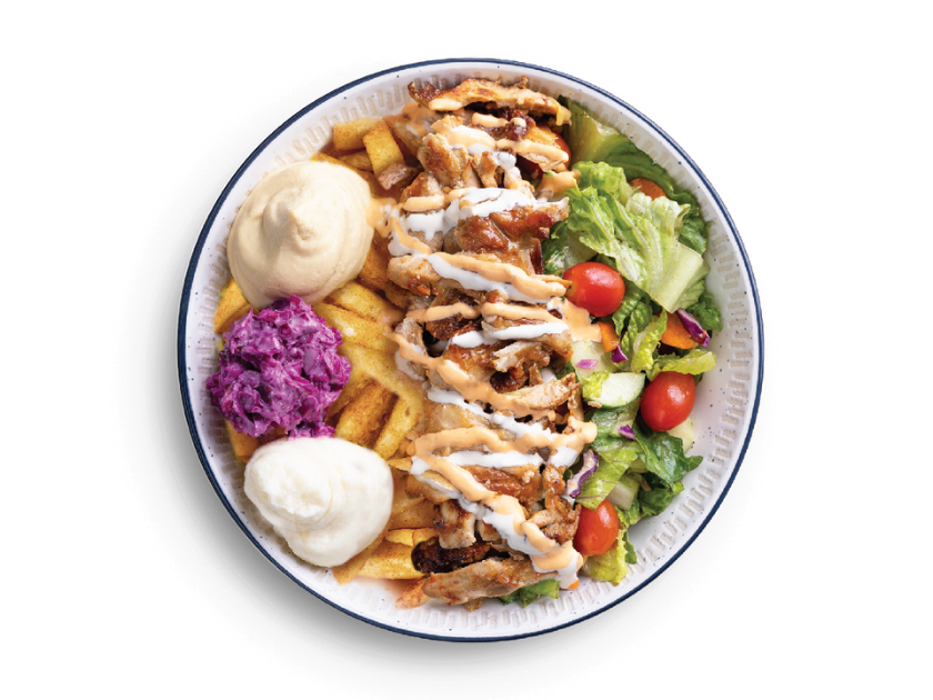 Chicken shawarma bowl with rice, fries or fattoush salad, tahini, parsley, tomatoes, pickles and garlic sauce